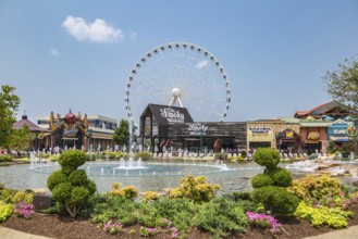 The Wheel ferris wheel behind the Ole Smoky Moonshine store at The Island recreation center in