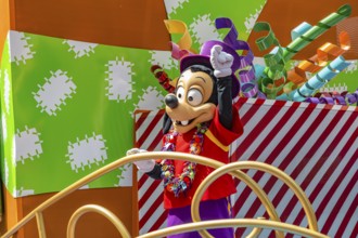 Disney character riding on float during parade through the Frontierland area of Magic Kingdom at