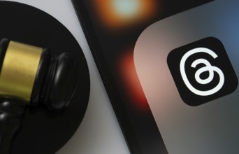 Dhaka, Bangladesh- 18 March 2025: A close up of an iPad screen displaying the threads app alongside