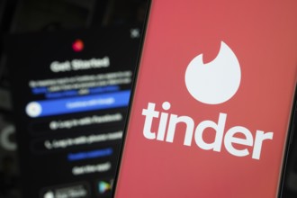Dhaka, Bangladesh- 18 March 2025: tinder logo is displayed on a smartphone screen, with the tinder