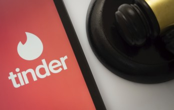 Dhaka, Bangladesh- 18 March 2025: A close up of an iPad screen displaying the tinder app alongside