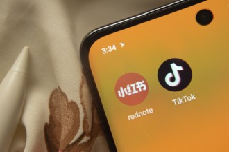 Dhaka, Bangladesh- 07 May 2025: Tiktok and rednote app icon is seen on smartphone