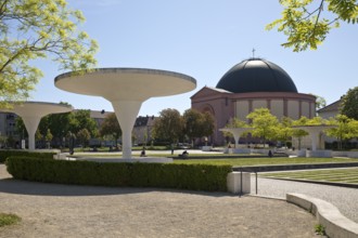 Georg-Büchner-Platz with white concrete mushrooms and St Ludwig's Church, public square, Darmstadt,
