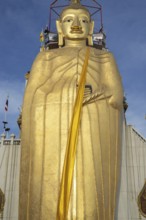 32 metre high standing Buddha decorated with glass mosaics and 24 carat gold, the upper knot of the