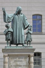 Monument to theologian, pedagogue and poet, August Hermann Francke, man with two children, protect,
