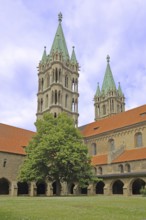 Late Romanesque UNESCO Cathedral of St Peter and St Paul with twin towers, inner courtyard with