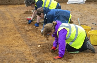 Time Team archaeologists excavating Garden Field at Sutton Hoo, Suffolk, England, UK 2025