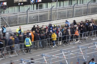 Festival visitors stream via separate entrances to the front breakwaters in front of the Utopia