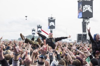 Festival visitor crowdsurfing at the Rock am Ring Festival on Friday, Nürburgring race track race