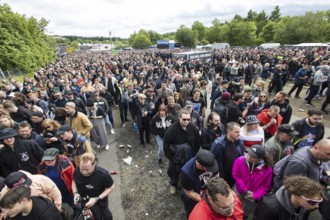 Festival visitors in front of the main entrance at the Rock am Ring Festival on Friday, Nürburgring