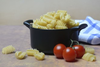 Italian pasta, Radiatori variety, in pots