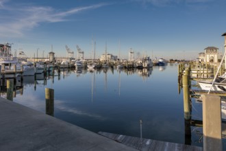 Sailboats and fishing boats docked in the Small Craft Harbor at Gulfport, Mississippi, USA