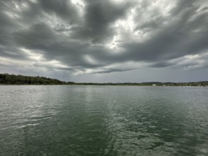Dark clouds over Lake Starnberg, Bavaria, Germany