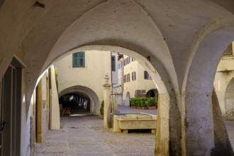Arcades, archways in the old town centre, Neumarkt, Unteretsch, South Tyrol, Italy