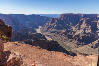 Colorado River runs between rock formations at Guano Point in Grand Canyon West near Peach Springs,