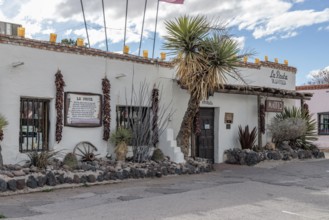 Territorial style adobe brick architecture of the La Posta de la Mesilla restaurant building in