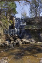 Water diverted from nearby Chunky River to this man-made waterfall to power a grist and cotton mill