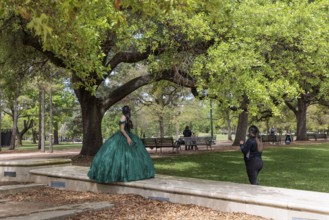 Live Oak trees line the sides of the Mary Gibbs and Jesse H. Jones Reflection Pool at Hermann Park