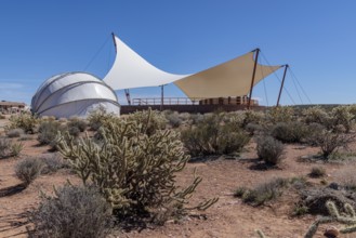 Shade structures provide visitors relief from the desert sun at Eagle Point in Grand Canyon West