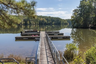 Floating dock with rental boats at The Lodge in the Pin Oak area of Natchez Trace State Park near