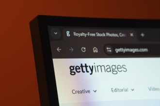 Close-up of a computer screen displaying the Getty Images web interface in dark mode
