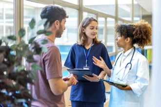 Medical professionals collaborating, sharing expertise, and providing optimal patient care in a