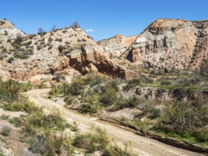 Gravel road, Gorafe desert, colorful canyons, rock formations, Gorafe Desert, UNESCO Granada