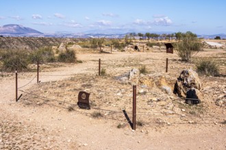 Signpost at the Gorafe megalithic park, megalithic grave, Gorafe desert, Andalusia, Spain
