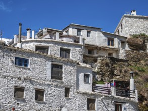 Whitewashed facade of a tradtional house, village Trevelez, one of the whitewashed villages on the