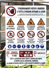 Construction site protection with prohibition signs in Italy