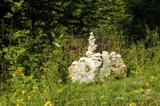 Cairn to mark the edge of the path, near the Schertelshöhle cave, Swabian Alb, Germany