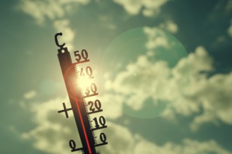 Symbolic image heat wave, thermometer in the sun, summer, climate change, temperature, record heat,
