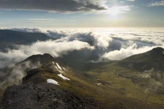 Clouds moving in, summit area of Mt Slættaratindur, Eysturoy, Faroe Islands, Denmark