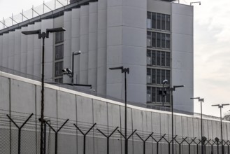 Stammheim prison, JVA. Exterior view with prison wall and barbed wire. Stuttgart,