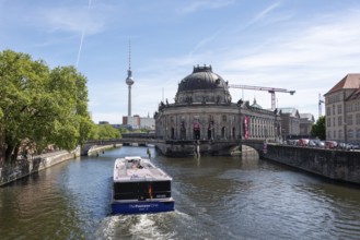 Museum Island, Bodemuseum, behind it the television tower, in front the Spree with the ship The