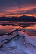 Dawn, mountains reflected in lake, clouds, ice, frozen, winter, Lake Kochel, view of Rabenkopf,