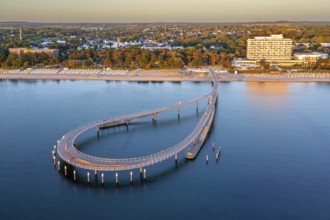 Aerial view over Maritim Seebrücke / maritime pier over the Baltic Sea at seaside resort