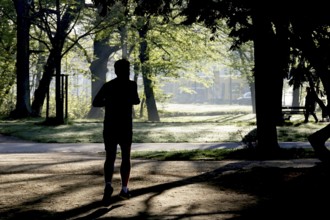 Jogger in a park, spring, Germany