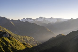 Mountain landscape in morning mood, view of the summit of the Großvenediger at sunrise, view from