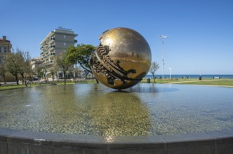 Sfera Grande, sculpture by the artist Arnaldo Pomodoro on the promenade in Pesaro, Marche region,