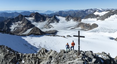 Panorama at the summit of the Wilder Freiger with summit cross and with glacier Übeltalferner and