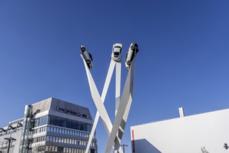 Inspiration 911 artwork by Gerry Judah: three steles, each presenting a Porsche 911 at a height of