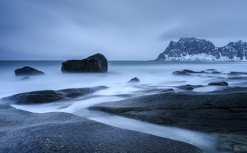 Blue Hour, rocks on the coast in Uttakleiv, Lofoten, Norway