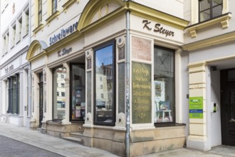 Historic facade of a stationery shop on the Obermarkt, Freiberg, Saxony, Germany