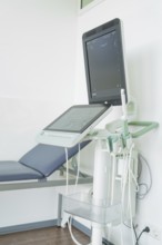 Modern ultrasound machine in a medical environment with monitor and control unit, Urology, Germany