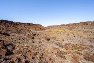 Barren landscape with boulders in a valley, desert landscape, Twyfelfontein, Kunene, Namibia