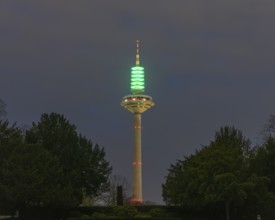 Green illuminated Europe Tower (Frankfurt asparagus) for the Day of Children's Hospice Work,