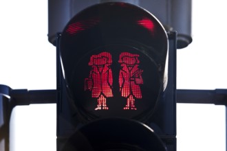 Pedestrian traffic light with red Brothers Grimm Ampelmännchen, Hanau, birthplace of the brothers,