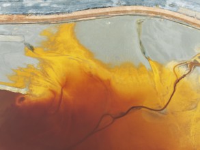 Waste pond in the mineral-rich area of the Rio Tinto mines. The colour is caused by oxidised iron