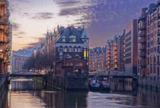 The moated castle in Hamburg's Speicherstadt between the Holländischbrookfleet and the